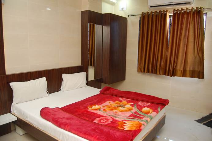 Imagen de la habitación del Hotel Milan, Dwarka. Foto 6