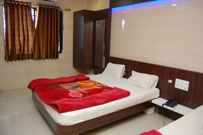 Imagen de la habitación del Hotel Milan, Dwarka. Foto 7