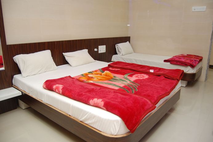 Imagen de la habitación del Hotel Milan, Dwarka. Foto 8