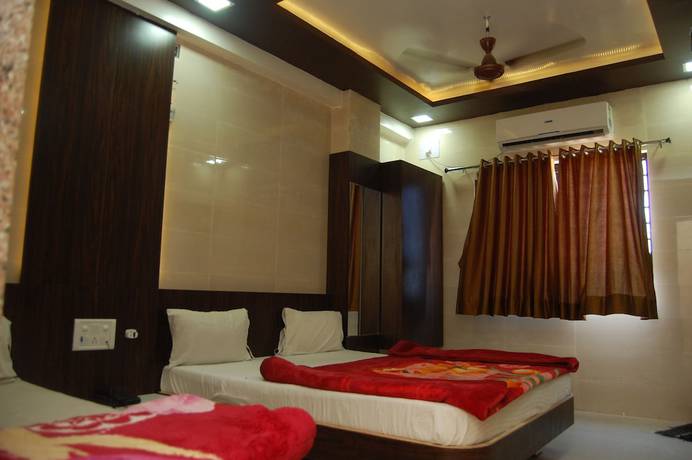 Imagen de la habitación del Hotel Milan, Dwarka. Foto 12