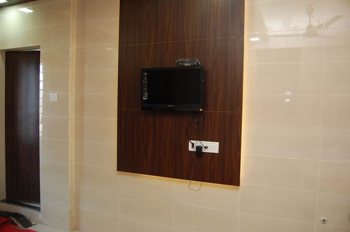 Imagen de la habitación del Hotel Milan, Dwarka. Foto 13