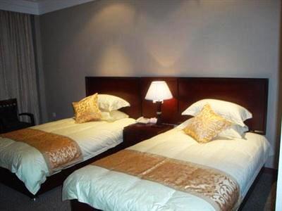 Imagen de la habitación del Hotel Milan FX Hotel - Suzhou. Foto 4