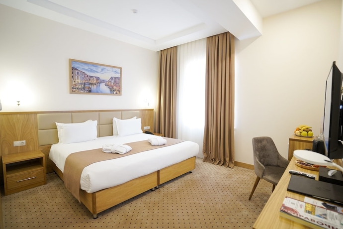 Imagen de la habitación del Hotel Milan, Taskent. Foto 6