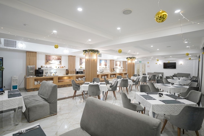 Imagen del bar/restaurante del Hotel Milan, Taskent. Foto 2