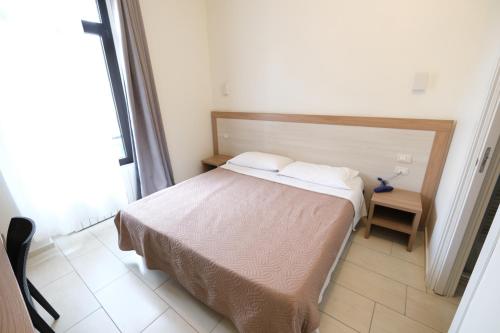 Imagen de la habitación del Hotel Milano 26. Foto 9