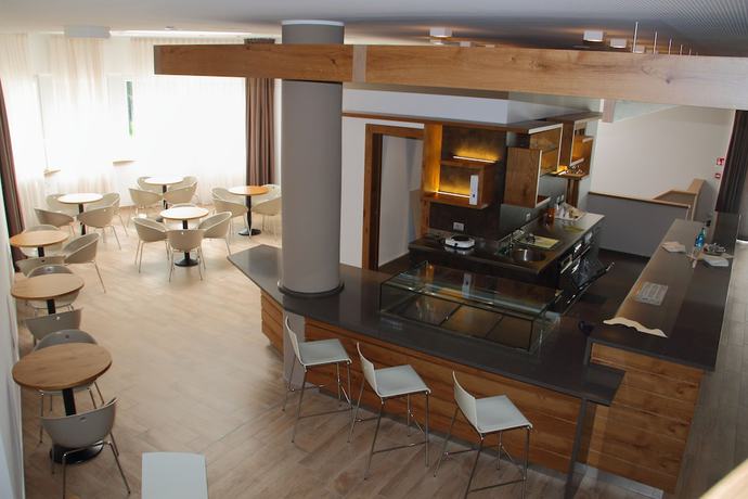 Imagen del bar/restaurante del Hotel Milano, Fondo. Foto 6