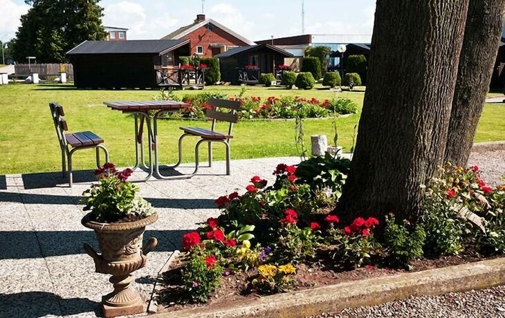 Imagen general del Hotel Milano Garden - City Bungalow l, I Gr&auml;nssnittet Till Kullabygdens P&auml;rlor. Foto 10