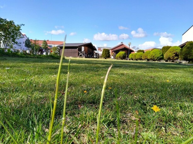 Imagen de los exteriores del Hotel Milano Garden - City Bungalow l, I Gr&auml;nssnittet Till Kullabygdens P&auml;rlor. Foto 23