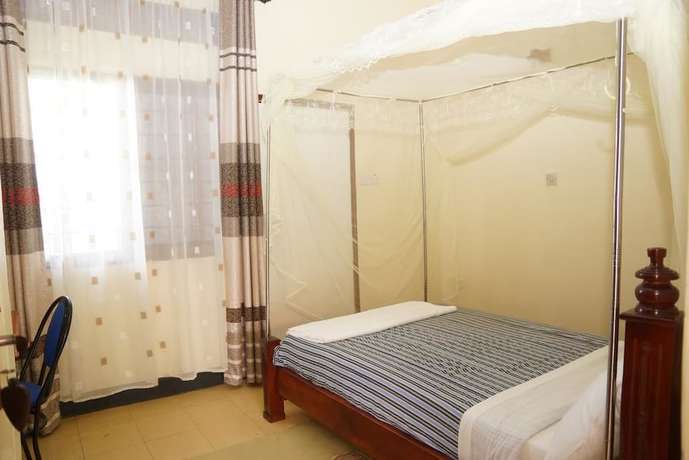 Imagen de la habitación del Hotel Milano, Kampala. Foto 19