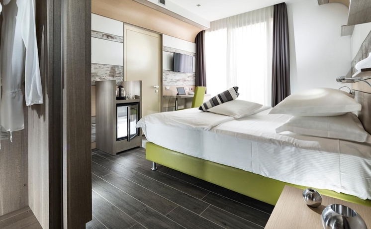 Imagen de la habitación del Hotel Milano Resort. Foto 8