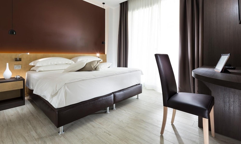 Imagen de la habitación del Hotel Milano Resort. Foto 10