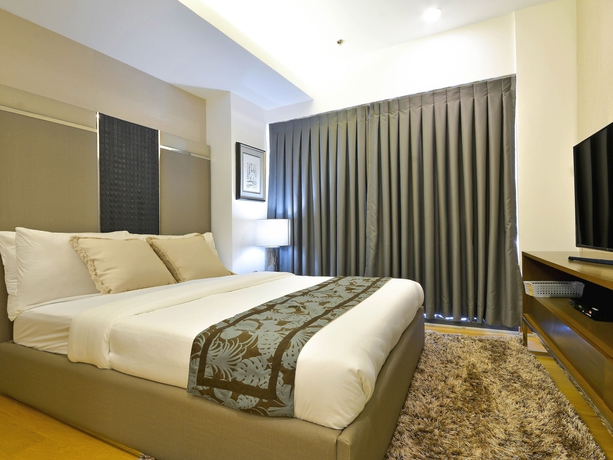 Imagen de la habitación del Hotel Milano Versace Suites. Foto 4