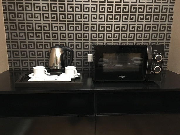 Imagen de la habitación del Hotel Milano Versace Suites. Foto 8