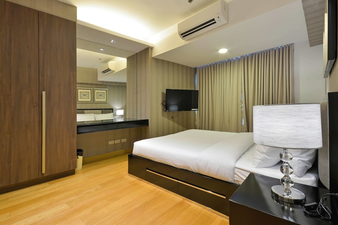 Imagen de la habitación del Hotel Milano Versace Suites. Foto 11