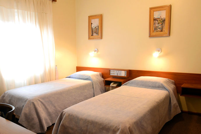 Imagen del bar/restaurante del Hotel Milão. Foto 2