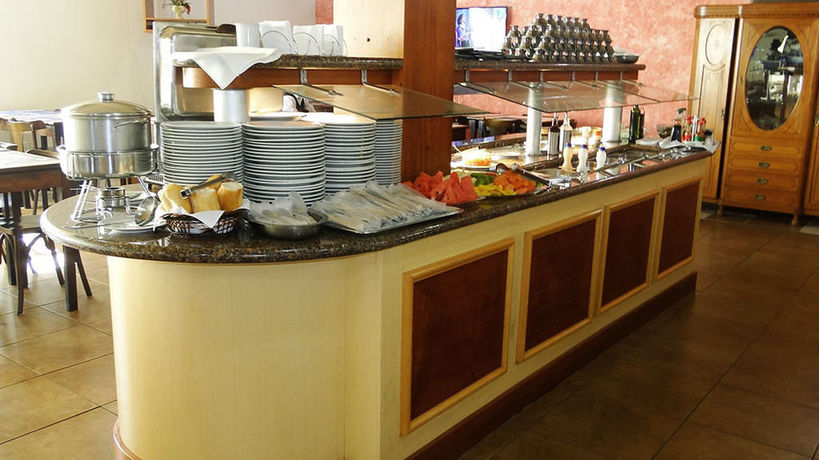 Imagen del bar/restaurante del Hotel Milão. Foto 3