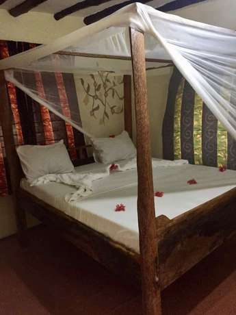 Imagen de la habitación del Hotel Milele Lodge. Foto 12