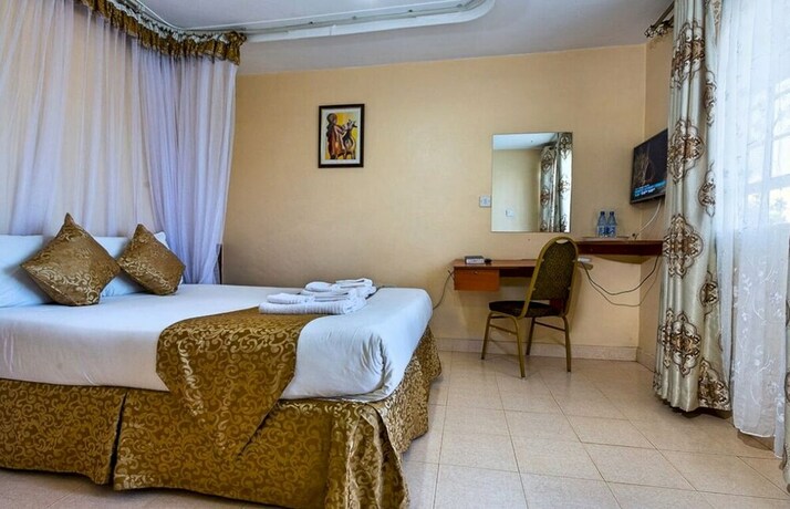 Imagen de la habitación del Hotel Milele Resort Nakuru. Foto 16