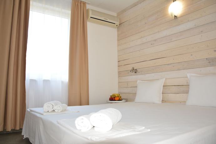 Imagen de la habitación del Hotel Milennia Family. Foto 3
