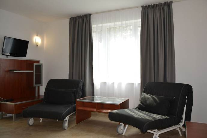 Imagen de la habitación del Hotel Milennia Family. Foto 4