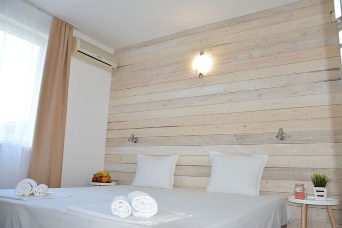 Imagen de la habitación del Hotel Milennia Family. Foto 8