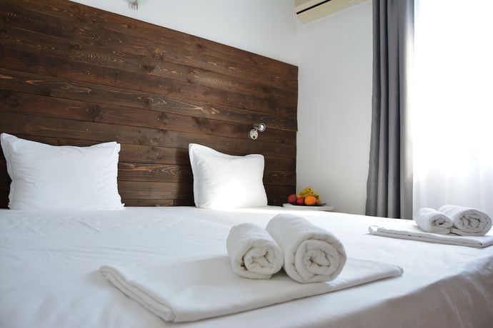 Imagen de la habitación del Hotel Milennia Family. Foto 11