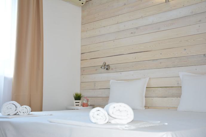 Imagen de la habitación del Hotel Milennia Family. Foto 13