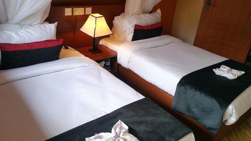 Imagen de la habitación del Hotel Milimani Beach Resort. Foto 8