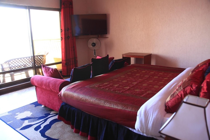 Imagen de la habitación del Hotel Milimani Beach Resort. Foto 10