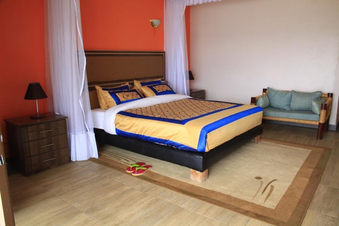 Imagen de la habitación del Hotel Milimani Beach Resort. Foto 13