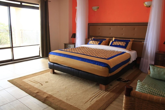 Imagen de la habitación del Hotel Milimani Beach Resort. Foto 14