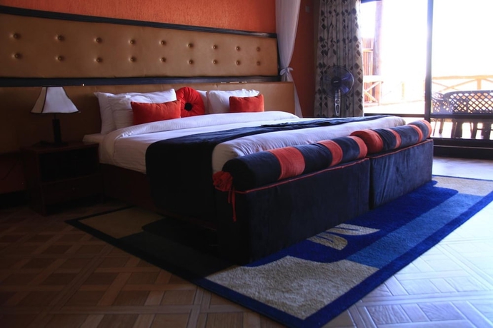 Imagen de la habitación del Hotel Milimani Beach Resort. Foto 17