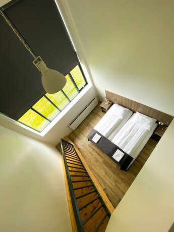 Imagen de la habitación del Hotel Milk Factory. Foto 18