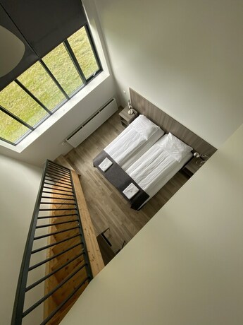 Imagen de la habitación del Hotel Milk Factory. Foto 28