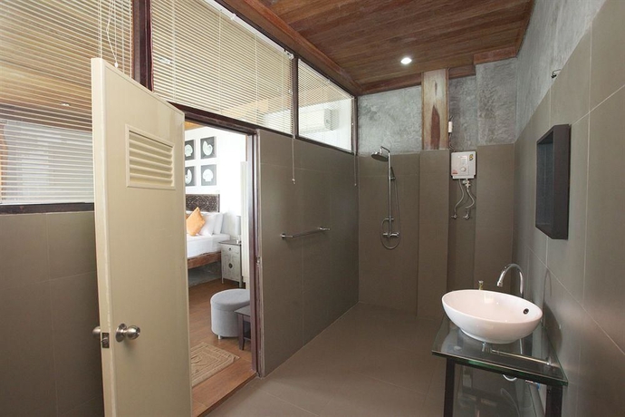 Imagen de la habitación del Hotel Milky Bay Resort. Foto 6