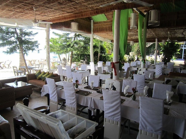 Imagen del bar/restaurante del Hotel Milky Bay Resort. Foto 3