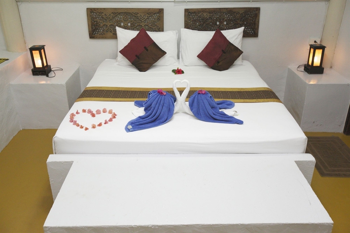 Imagen de la habitación del Hotel Milky Bay Resort. Foto 8