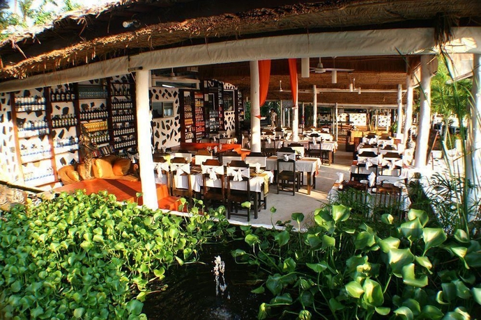 Imagen del bar/restaurante del Hotel Milky Bay Resort. Foto 4