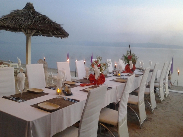 Imagen del bar/restaurante del Hotel Milky Bay Resort. Foto 5