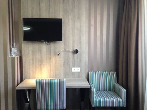 Imagen de la habitación del Hotel Mille Colonnes. Foto 7