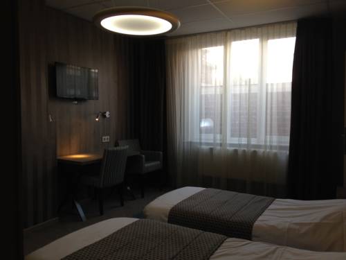 Imagen de la habitación del Hotel Mille Colonnes. Foto 9