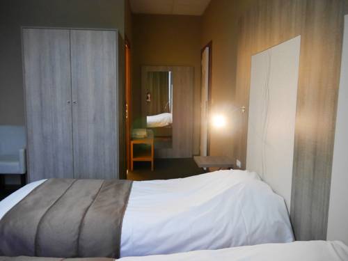 Imagen de la habitación del Hotel Mille Colonnes. Foto 10