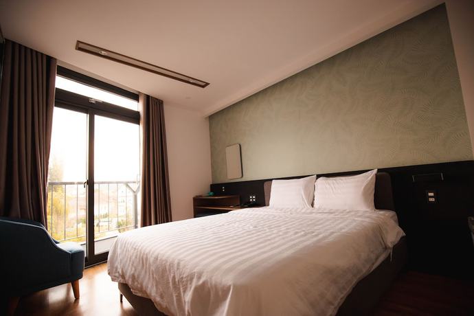 Imagen de la habitación del Hotel Mille Fleurs 02. Foto 5