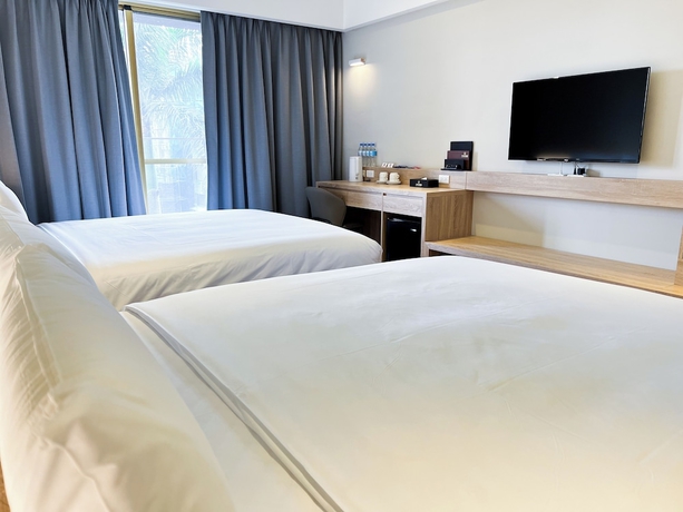 Imagen de la habitación del Hotel Mille Rich hotel. Foto 11