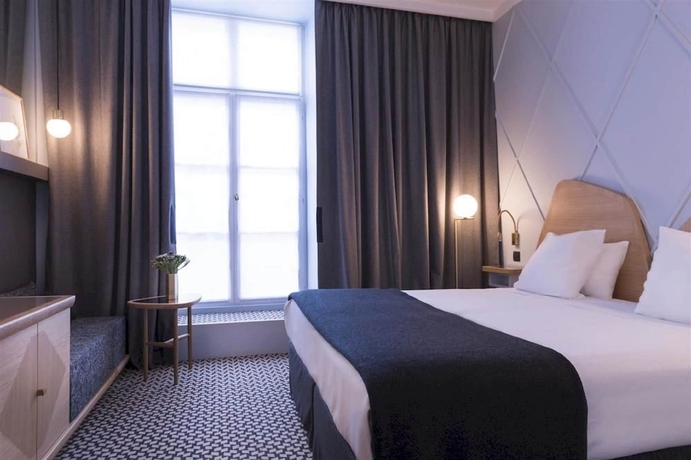 Imagen de la habitación del Hotel Millésime. Foto 10