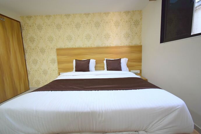 Imagen de la habitación del Hotel Millennium, Ahmedabad. Foto 20