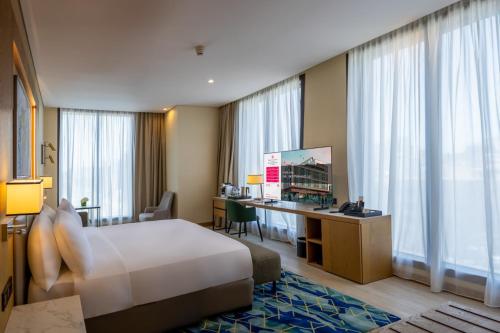 Imagen de la habitación del Hotel Millennium Al Masar. Foto 9