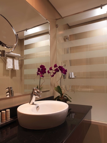 Imagen de la habitación del Hotel Millennium Central Downtown. Foto 5