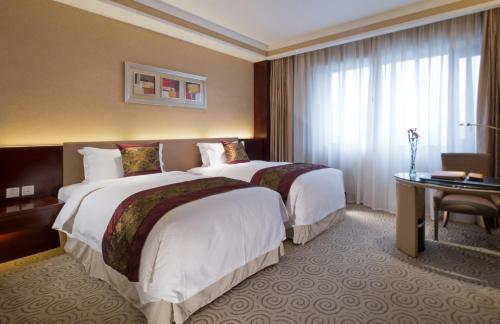 Imagen de la habitación del Hotel Millennium Chengdu. Foto 9