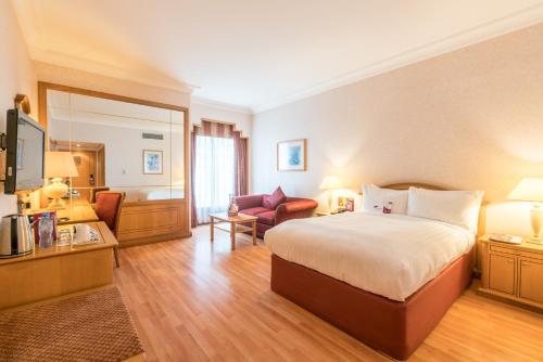 Imagen de la habitación del Hotel Millennium Downtown. Foto 19